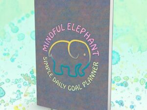 ELEPHANT-DAILY-WORK-PLANNER-02-UPDATED-CENTRAL-DESIGN-MOCK-UP-BOOK.jpg Mindful Elephant Simple Daily Goal Planner